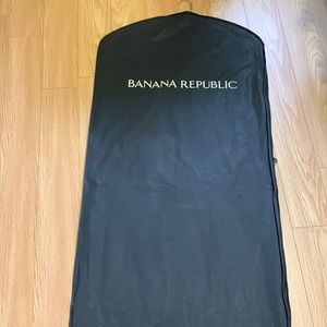 Almost new black banana republic suit and dust bag.